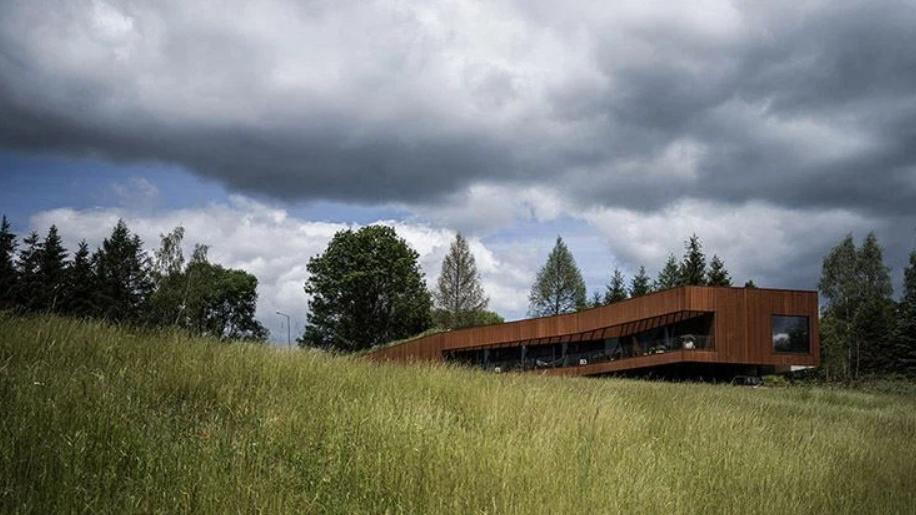 Corten Steel House in Poland: Harmonious Integration with Nature