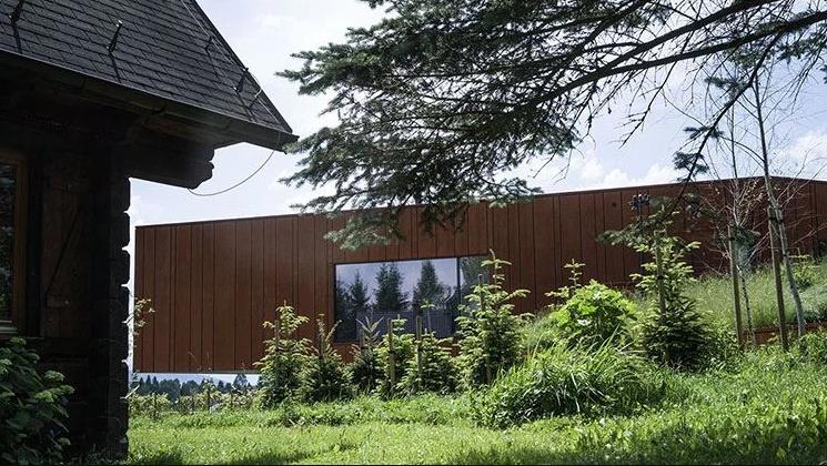 Corten Steel House in Poland: Harmonious Integration with Nature